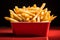 Isolated red box holds delicious fries in a tempting display