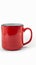 Isolated red mug in striking close up on white background