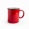 Isolated red mug in striking close up on white background