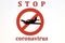 Isolated red prohibition sign with airplane icon. Aircraft prohibition concept with Stop Coronavirus inscription