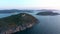 Isolated remote lighthouse on high cliff i dramatic coastal landscape in High Coast of Sween