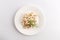 Isolated russian national olivier salad on white