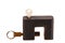 Isolated rusted black lock with key