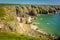 An isolated sandy bay with stacks on the Pembrokeshire coast, Wales near Castlemartin