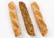 Isolated shot of the pieces of Baguette bread on a white background