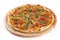Isolated shot of a pizza with green onion and tomatoes - perfect for a food blog or menu usage