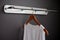 Isolated shot of wooden coat hanger for hanging clothes. Generative AI