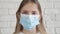 Isolated Sick Kid with Protection Mask in Coronavirus Pandemic, Sad Child Unhappy Bored Teenager Girl in Covid-19 Crisis