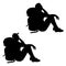 Isolated silhouette of a sitting hiker girl