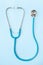 Isolated stethoscope as the main tool for primary diagnosis of a cardiologist and therapist patient. Symbol of medical