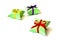 Isolated three apple-green paper gift boxes for jewelry with red, violet, golden satin ribbons bows on white background