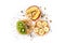 Isolated three healthy rice cake meal with peanut butter, kiwi slice, banana, seeds and apple on white background