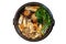 Isolated top view of Sukiyaki hot pot with boiling vegetables including cabbage, konjac noodle, onion, carrot, shiitake.