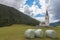 Isolated traditional church in the middle of meadows of South Tyrolean valley