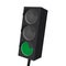 Isolated traffic light with green light on