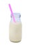 Isolated vanilla milkshake in a bottle with pink straw