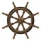 Isolated vintage brown wooden boat steering wheel