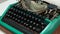 Isolated vintage typewriter keyboard. Slow dolly across type writer keys. Macro shot of retro typewriter keys. typewriter and nove