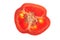 Isolated on a white background. Top view. Close-up of a piece of sweet red bell pepper with seeds inside. Detail of half