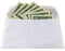 Isolated white envelope with dollars on white,