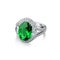 Isolated white gold ring with diamonds and huge green emerald