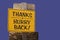 Isolated wood and metal sign board that says Thanks Hurry Back.