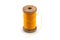 Isolated wooden spool of yellow thread