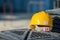 Isolated yellow worker hard-hat,natural light in construction si