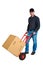 Isolated young delivery man with his hand truck