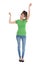 Isolated young woman in green shirt and blue jeans cheering and