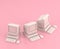 Isometric 3d Icon, three old computers with keyboard and mouse in flat color pink room,single color white, cute toylike household