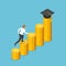 Isometric businessman running to graduation cap on the highest stack of coin