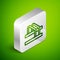 Isometric line Bicycle parking icon isolated on green background. Silver square button. Vector