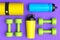 Isometric view of sport equipment like dumbbell, water bottle and yoga mat