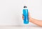 Isotonic energy drink bottle copy space background.