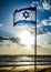 Israel flag waving cloudy sky background sunset