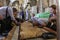 Israel - Jerusalem - Basilica of the Holy Sepulchre - the stone of anointing. The faithful touch the stone to be blessed