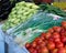 Israel market produce: green onion, tomatoes, zukini, and eggplant