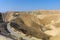 Israel Negev desert. View over the Negev desert, with in the distance the city of Jericho and the road that runs there View from a