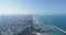 Israel skyline from a drone. Panoramic Aerial view above coastline of Tel Aviv modern and business city with hotels