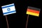 Israeli flag with German flag on black