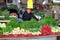 Israeli man sells fresh vegetables Carmel market, Tel Aviv