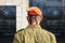 Israeli soldier in front of blurred monuments with Jewish stars at the Jewish cemetery in Israel.