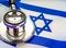 Israelite Sanitation. Medical stethoscope on an Israeli flag. Israelite medical insurance concept