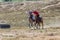 ISSYK KUL, KYRGYZSTAN - JULY 15, 2018: Performance of kyz kuuma girl chasing , equestrian traditional sport at the