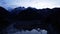 Issyk mountain lake with mirror water at sunset.