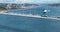 Istanbul Bosphorus Bridge and City Skyline in Background with Turkish Flag at Beautiful Sunset, Aerial slide orbiting