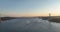 Istanbul Bosphorus Bridge and City Skyline in Background with Turkish Flag at Beautiful Sunset, Aerial slide orbiting