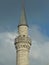 Istanbul city Mosque minaret, blue sky in background