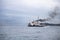 In Istanbul, ferries operate on the Bosphorus line. Traditional old steamers. Cloud weather in the background